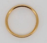 A George V 22ct gold wedding band, hallmarked for Birmingham, 1925, size N, 4.8 grams. Condition - fair to good